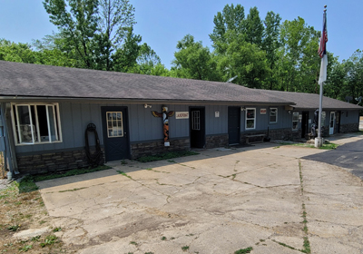 Our Office, Arcade, Shower House, and Restrooms can be seen on the left as you enter Rocky Falls RV Park and Campground.